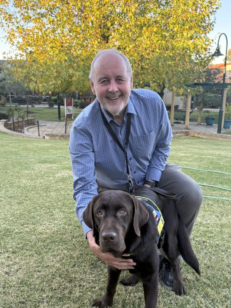 Ron Hooton with brown dog